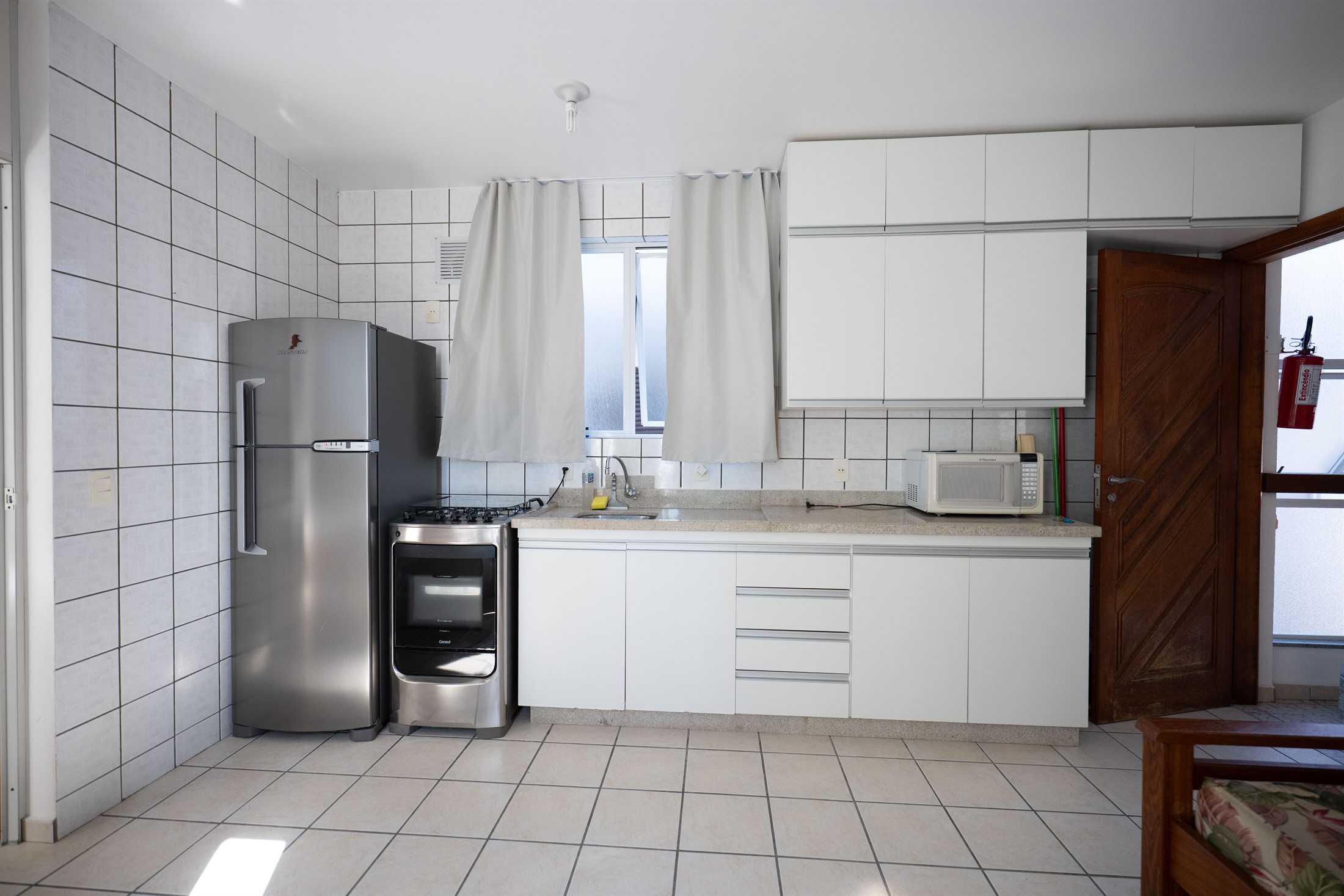 Cozinha completa do Apto Studio